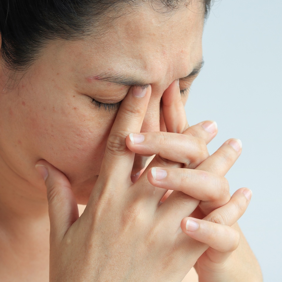 Woman face with sinusitis or sinus pain, health concept