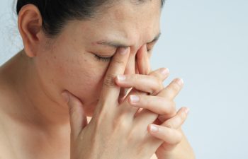 Woman face with sinusitis or sinus pain, health concept