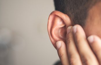 Ear pain and clogged ears concept